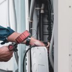 AC repair vs replace cost Canada